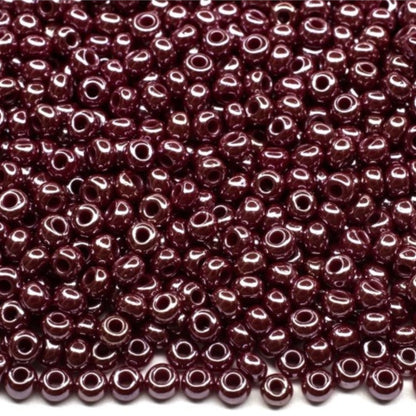 10/0 98310 Preciosa Seed Beads. Opaque Sfinx red brown.