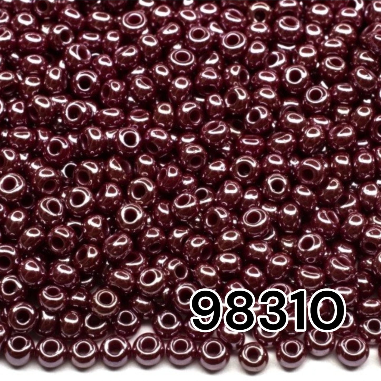 10/0 98310 Preciosa Seed Beads. Opaque Sfinx red brown.